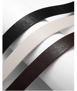 Detailed texture of slim leopard print belts in black, beige and dark brown colors