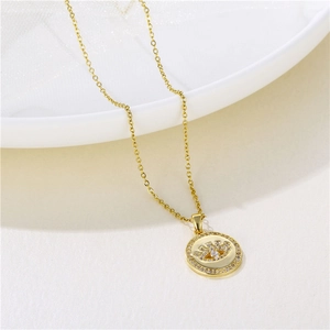 Collier turc mauvais œil doré avec zircons et chaîne croisée en acier inoxydable