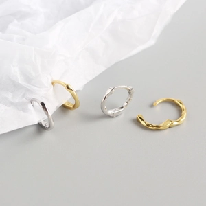 Minimalist S925 sterling silver knot hoop earrings in polished gold and silver finishes