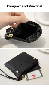 Detail of black PU leather coin purse showing internal storage for cards and cash