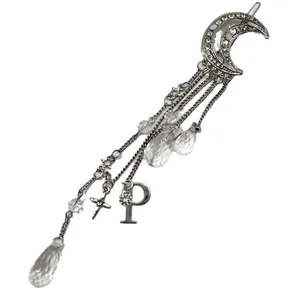 Silver crescent moon hair clip with sparkling stars and crystal waterdrop tassels