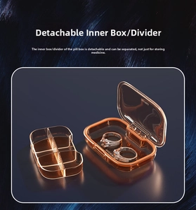Detail of amber portable organizer with removable dividers for pills or jewelry storage