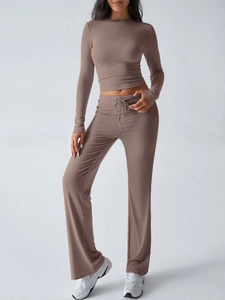 Brown Y2K style long sleeve top and drawstring pants set made of stretch knit fabric