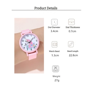 Detailed view of kids quartz watch with pink unicorn dial and soft silicone strap