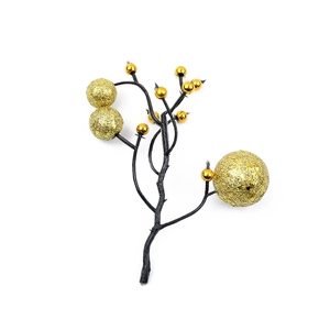 Christmas artificial golden berry branch with glitter and glossy finish on white background