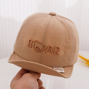 Detailed embroidery of bear icon and text on soft camel baby outdoor sun hat