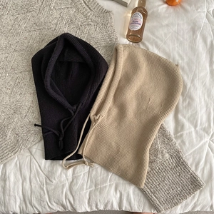 Women's knitted balaclava hood with drawstring in black and beige winter colors