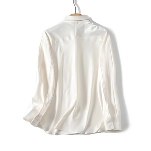 Elegant white satin long sleeve shirt featuring stylish batwing sleeves and glossy finish