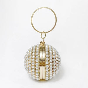 Luxurious spherical pearl evening handbag with golden circular handle for formal events