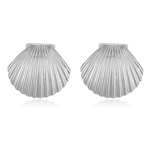 Detailed view of silver shell-shaped stud earrings with realistic ocean textures
