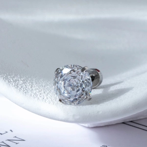 Polished titanium steel stud earring with four-prong set sparkling zircon on a stand