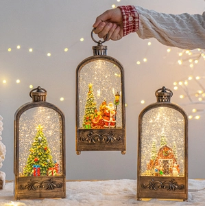 Detail of vintage bronze Christmas lanterns with snow globe scenes and festive lighting