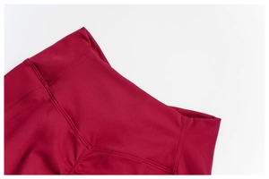 Detail of high waist yoga pants featuring V-shaped back seam and scrunch butt design