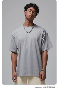 Lookbook shot of a grey oversized 190G cotton T-shirt showing soft fabric and loose fit