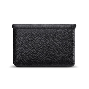 Mini black genuine leather coin purse with soft pebble grain texture on white background