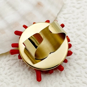Elegant 18k gold-plated ring featuring unique red coral petal design with open adjustable band