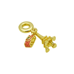 Detailed close-up of golden Eiffel Tower and camera charm with red enamel accents