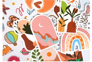Detailed flat lay of Bohemian DIY journal stickers with colorful nature and animal designs