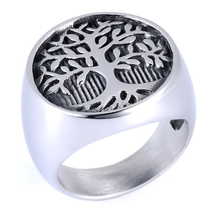 Macro detail of Tree of Life engraving on a vintage silver-style stainless steel ring