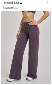 Detail view of high waist wide leg gym trousers in deep plum purple high elastic fabric