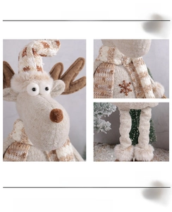 Dettaglio del peluche renna di Natale con trama del cappello e ricamo a fiocco di neve