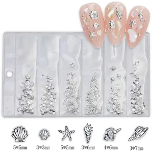 Detailed size chart for shell and starfish nail art charms in millimeters for manicure