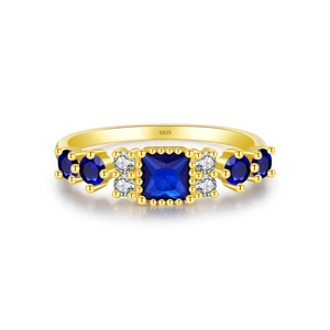 Elegant gold S925 silver ring featuring a square blue sapphire and sparkling side stones