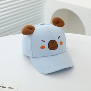 Detail of light blue kids baseball cap featuring 3D ears and cute bear embroidery