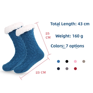 Detail view of thick cable knit slipper socks with plush fleece lining and dimensions