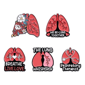 Five-piece medical enamel pin set featuring pink lungs with floral and heartbeat designs
