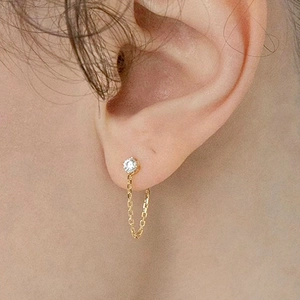 Elegant gold chain earrings with sparkling round zirconia stone in a U-shape drape style