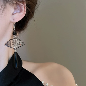 Detail of Chinese style ink painting fan earrings with black water drop pendants