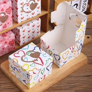 Colorful square Valentine's gift boxes with heart patterns in open and closed views