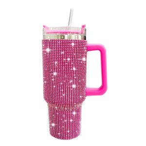 Pink rhinestone cow print 40oz stainless steel tumbler with handle and straw