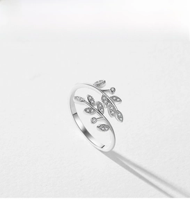 Close-up of S925 sterling silver leaf ring with delicate leaf details and cubic zirconia