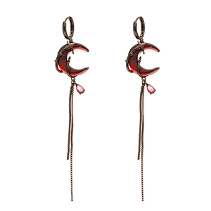 Vintage bronze crescent earrings with red resin, gold stars and long metal tassels