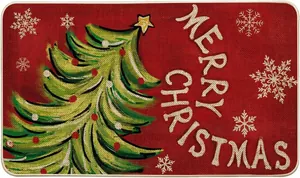 Close-up of red Christmas door mat with festive tree patterns and durable stitched edges