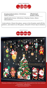 Detail of Christmas static window stickers showing Santa and reindeer on glass surfaces