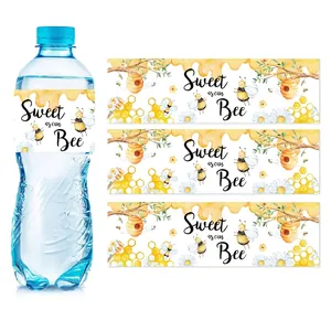 Water bottle labels with honey bee theme and 'Sweet as can Bee' artistic text design
