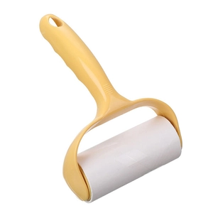 Manual lint roller with ergonomic yellow handle and white tear-off adhesive paper