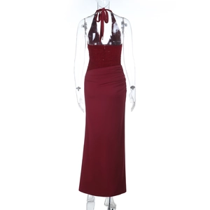 Back view of wine red halter dress featuring lace bodice and elegant ruched details