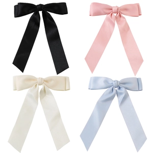 Satin bow hair clips set in black, pink, beige, and light blue with spring clip