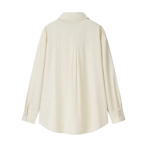 Detail view of the back of a beige long-sleeve striped shirt with vertical texture