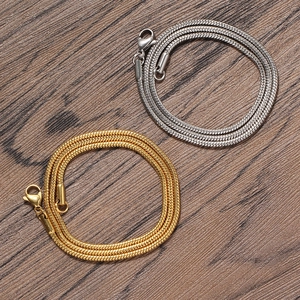 Detail of 2mm stainless steel round snake chains in gold and silver with lobster clasps