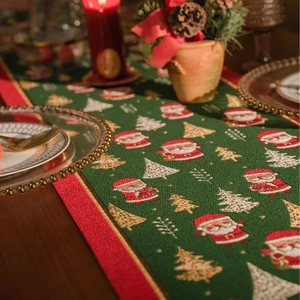 Christmas table runner with green jacquard Santa Claus and tree patterns for holiday decor