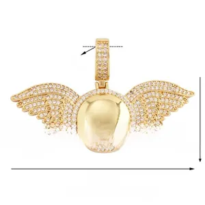 Detailed view of gold wing pendant with zircon pavé setting and exact size measurements