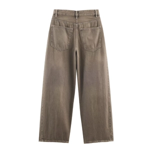 Women's baggy brown vintage barrel leg denim jeans showing the back view and pockets