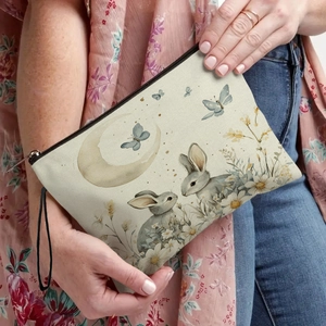 Canvas Easter bunny makeup bag with watercolor rabbit print and black wristlet strap