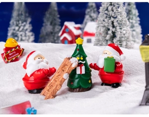Miniature Christmas set with Santa figures, tree, and wooden ladder for DIY decor