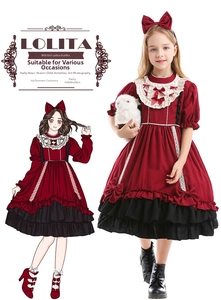 Detail of dark red Lolita dress with black lace trim and white decorative bows